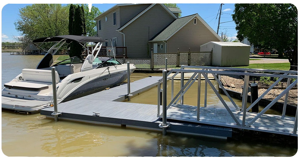 Residential floating dock with aluminum gangway installed by Anchor Electric, the premier Sarasota electrician.